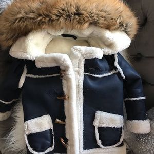Shearling coat with fur collar